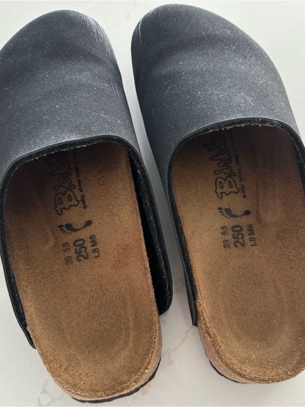 Birkenstock Black Slip-On Clogs with Brown Footbed